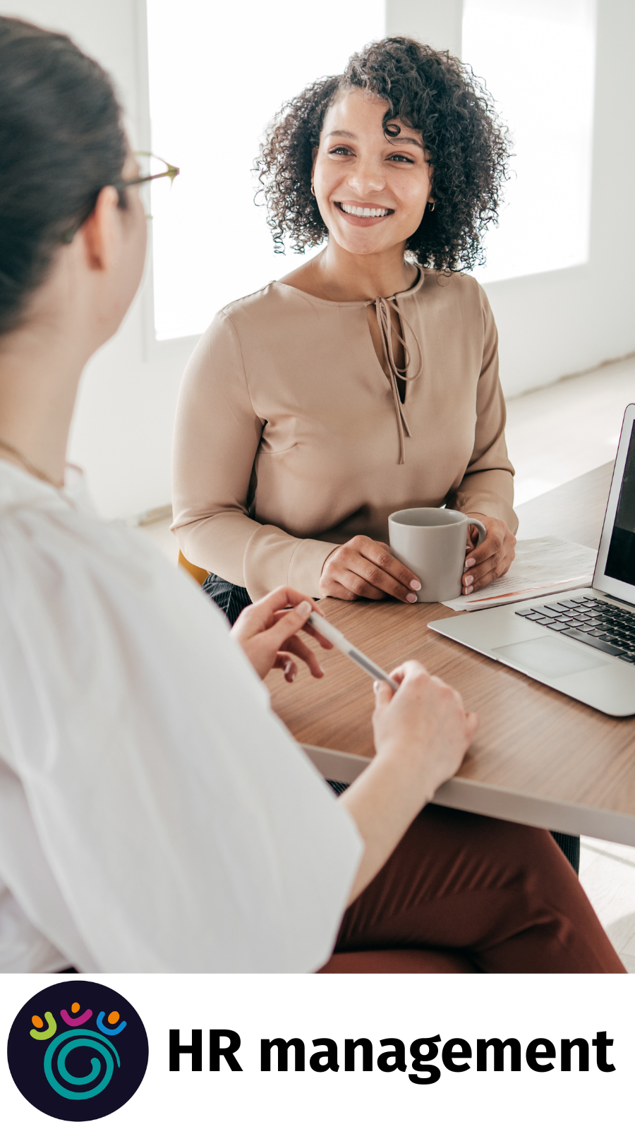 An HR manager talking to a member of the team